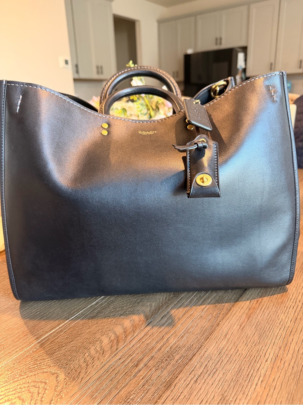 Coach Rogue 40 Black gold hardware.